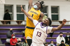 Illinois varsity high school game between the Corsairs of Carmel from Mundelein and the Bulldogs of Waukegan, at Waukegan High’s Washington Street gym, on Saturday Dec. 4, 2021. (photo by Vincent D. Johnson)  Photo copyright of Vincent David Johnson. http://www.VincentDavidJohnson.com
