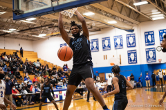 Hillcrest's Marcus Glover with a monster dunk against Bloom, in Chicago Heights on Wednesday, Nov. 24, 2021. (Vincent D. Johnson / Daily Southtown).