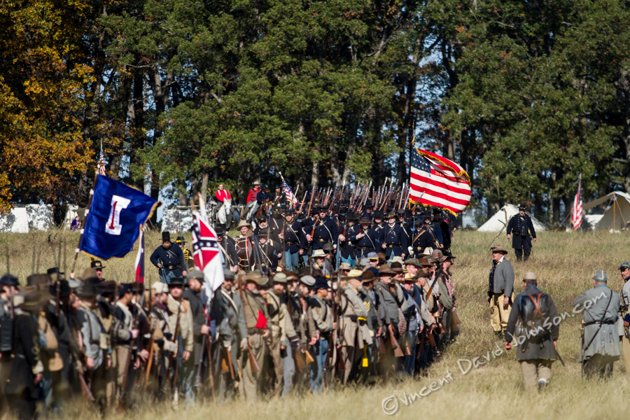 VINCENT D. JOHNSON - For Shaw Media  Confederate & Union Civil War reenactors gather in the middle of the battlefield before the start of the event, Oct. 17, 2015.