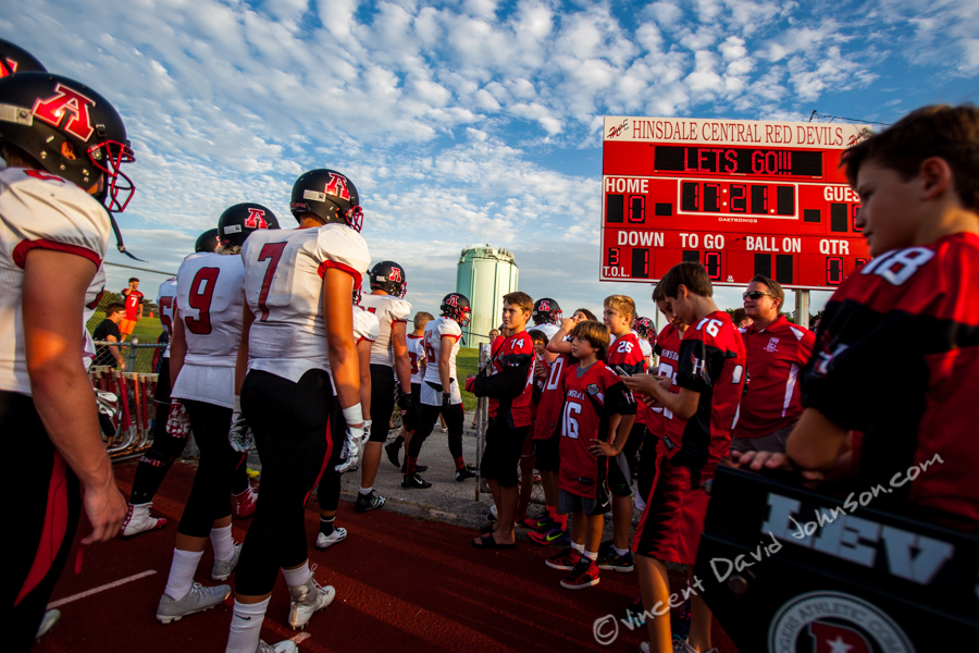 Hinsdale youth football players look at the players from American Fork like they were from another planet, Friday, August 26, 2016, in Hinsdale. (Vincent D. Johnson-Pioneer Press).